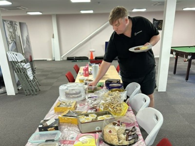 Macmillan afternoon tea team is selecting cakes 2